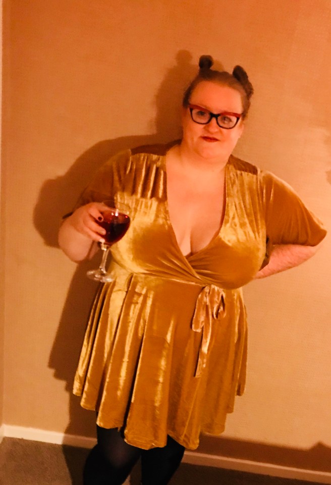 Happy plus size woman in velvet dress 