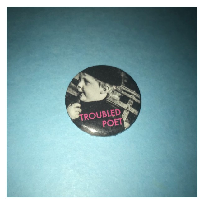 Troubled poet badge 