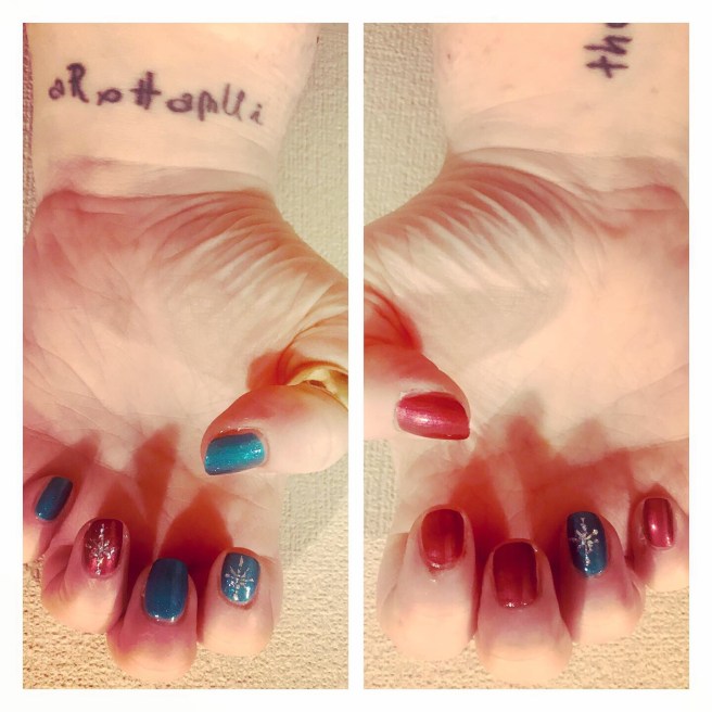 Xmas nail art. Holographic glitter stars on green sparkly base 