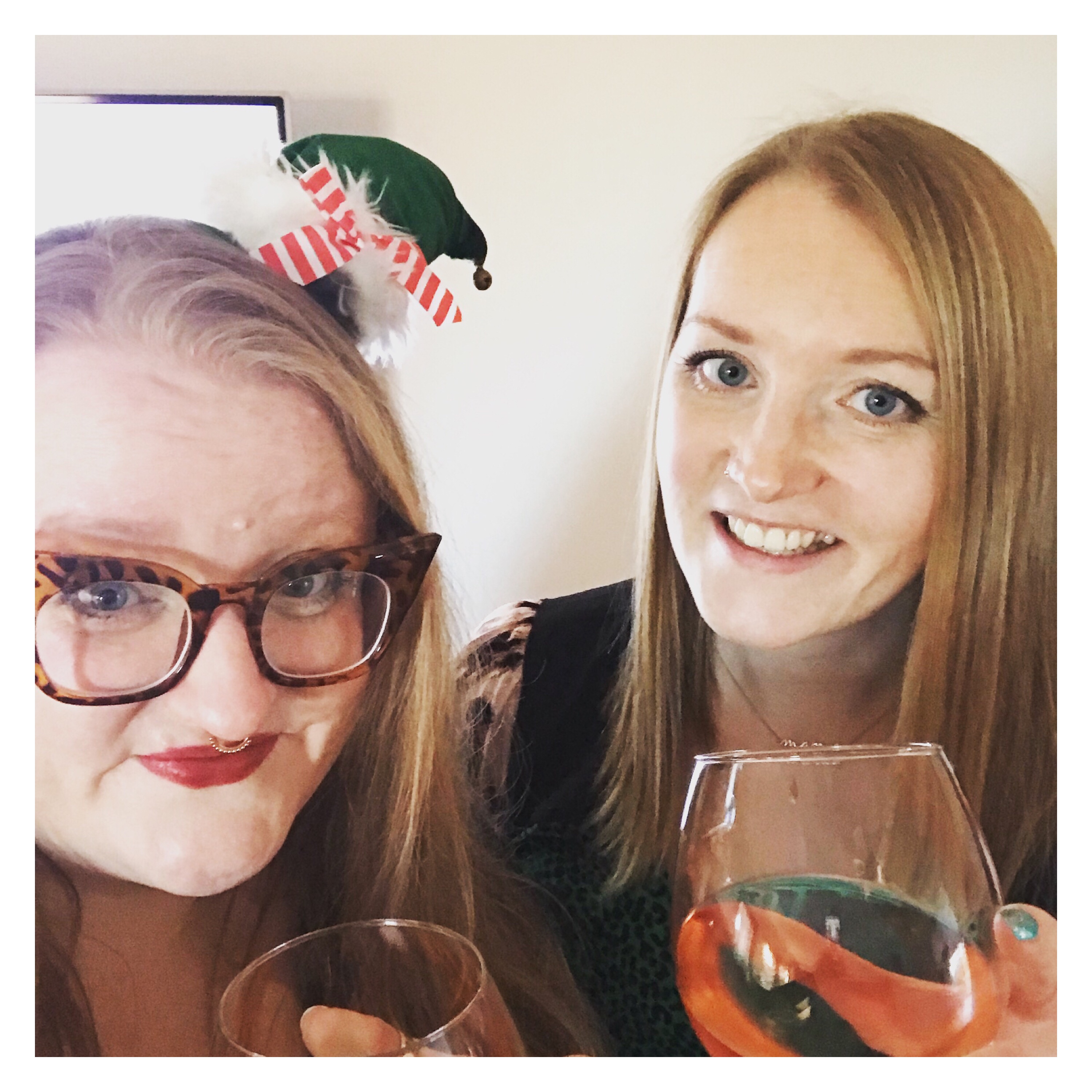 Two women drinking wine