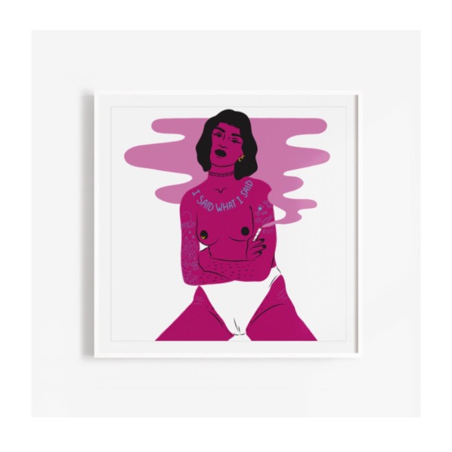 She’s angry print. A woman wearing white pants with the words I said what I said across her collar bones