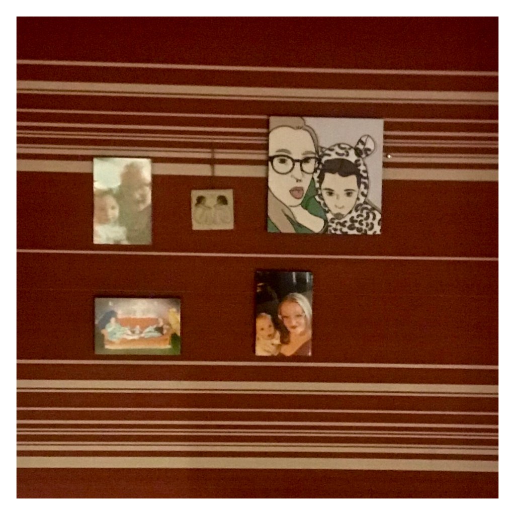 Digital portrait and photographs on wall 