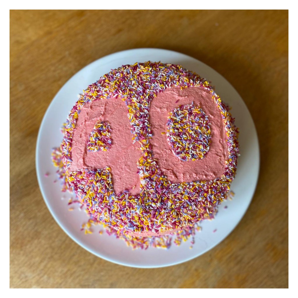 Pink birthday cake with sprinkles & 40 