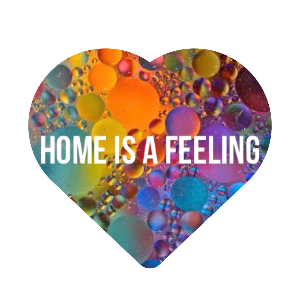 Home is a feeling in a background of multi coloured bubbles 