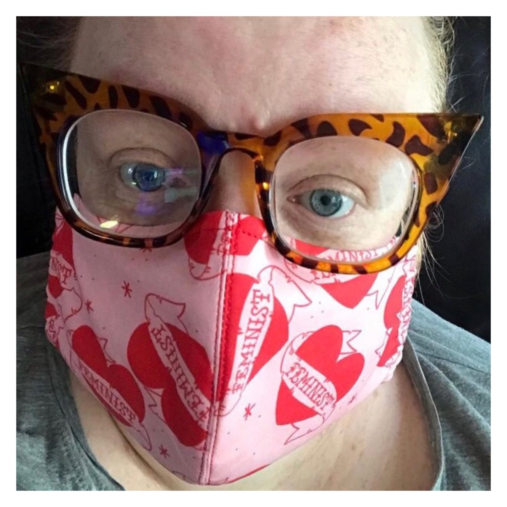 Ly is Weston big glasses and a feminist af face mask