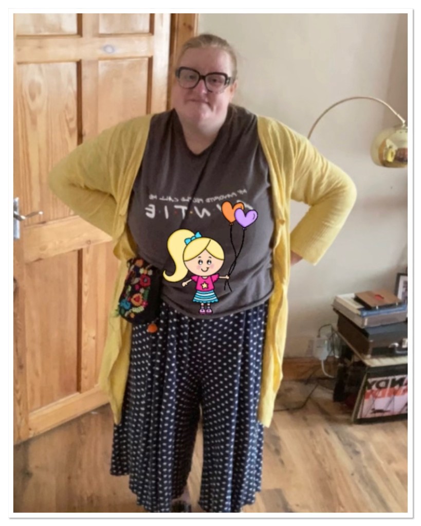 Picture of ly  with her hands on her hips and drawing of a child in her belly