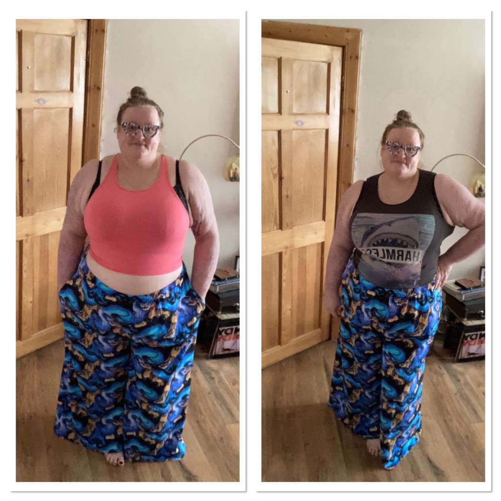 ly is wearing blue marble print trousers with two different tops, a coral pink crop top and great vest with a shark & the word harmless 